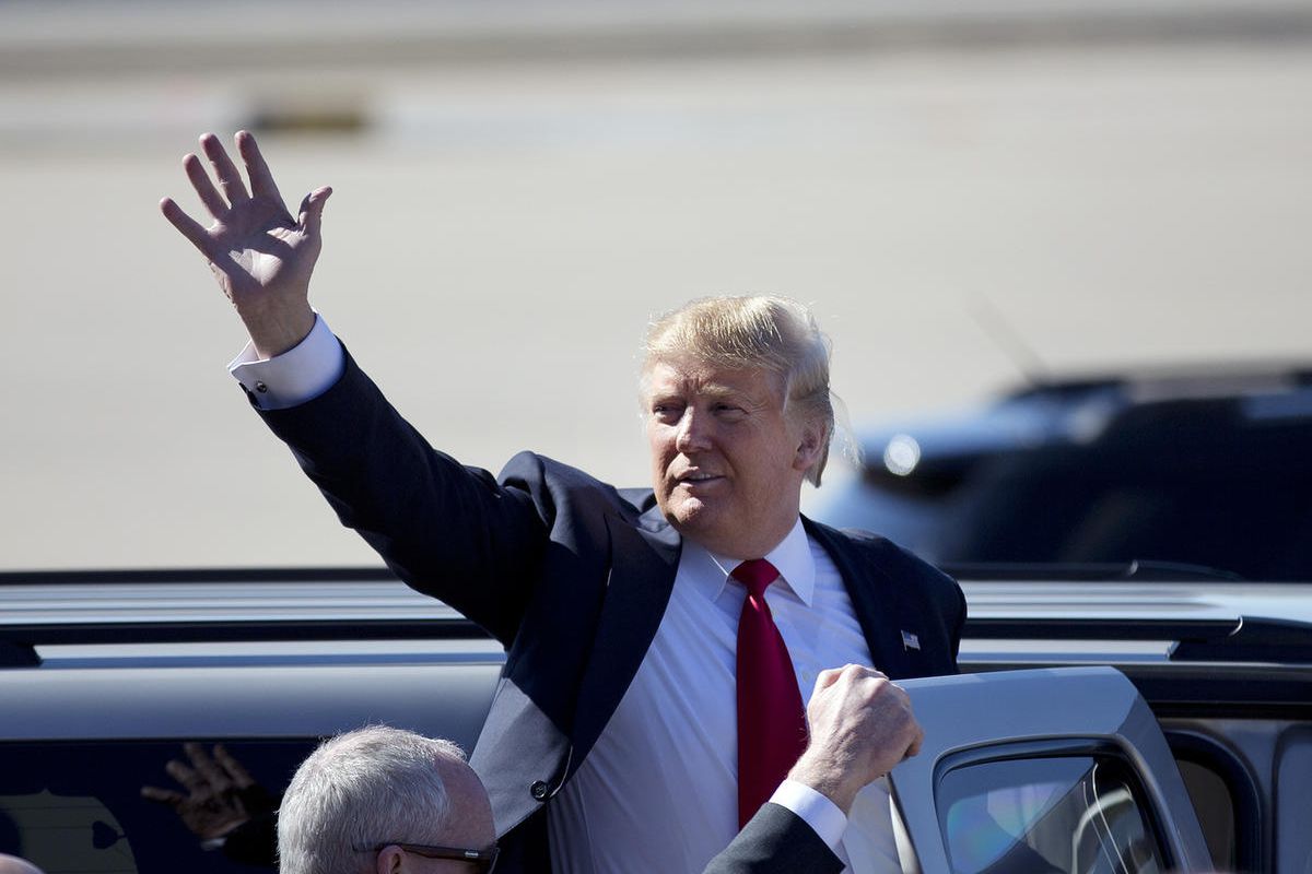 Republican presidential candidate Donald Trump waves as he leaves a rally Saturday, Feb. 27, 2016, in Bentonville, Ark. 