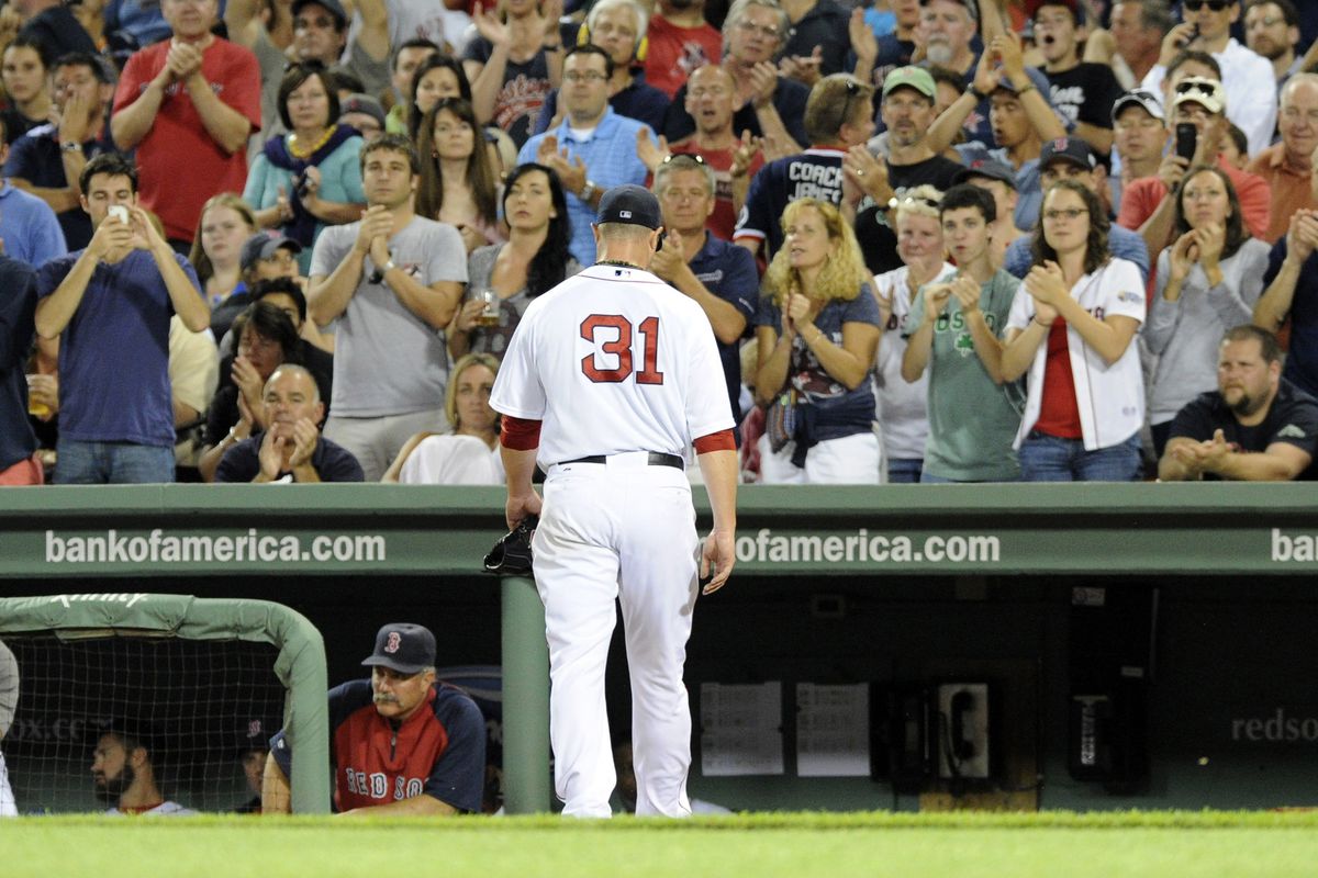 August 7, 2012; Boston, MA, USA; Boston Red Sox starting pitcher Jon Lester (31) walks to the dugout after being relieved during the seventh inning against the Texas Rangers at Fenway Park. Mandatory Credit: Bob DeChiara-US PRESSWIRE