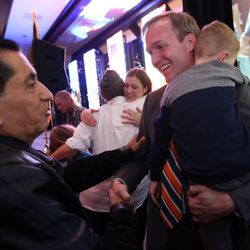 Salt Lake County Mayor Ben McAdams holds his son, Isaac, after speaking at the Utah Democrats' election night party at the Sheraton in Salt Lake City on Tuesday, Nov. 8, 2016.