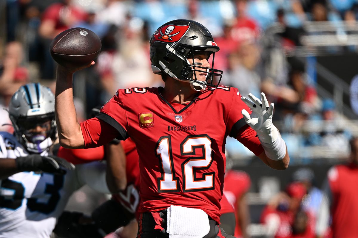 Tom Brady #12 of the Tampa Bay Buccaneers throws a pass in the third quarter against the Carolina Panthers at Bank of America Stadium on October 23, 2022 in Charlotte, North Carolina.