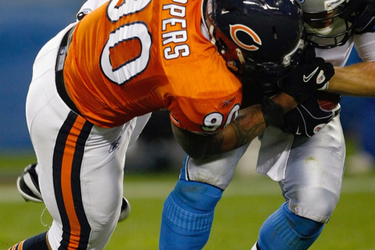 Julius Peppers #90 of the Chicago Bears sacks Matthew Stafford #9 of  the Detroit Lions. (Photo by Scott Boehm/Getty Images)