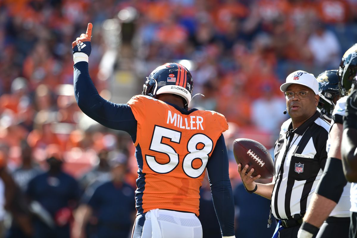 Denver Broncos outside linebacker Von Miller (58) celebrates his 100th career sack at Empower Field at Mile High.