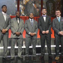 Heisman Trophy finalists Florida State quarterback Jameis Winston, left, Boston College running back Andre Williams, second from left, Auburn running back Tre Mason, center, Alabama quarterback AJ McCarron, second from right, and Texas A&M quarterback Johnny Manziel pose for a photo after the College Football Awards show in Lake Buena Vista, Fla., Thursday, Dec. 12, 2013.