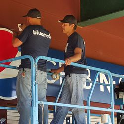 Workers put the finishing touches on a new concession area -