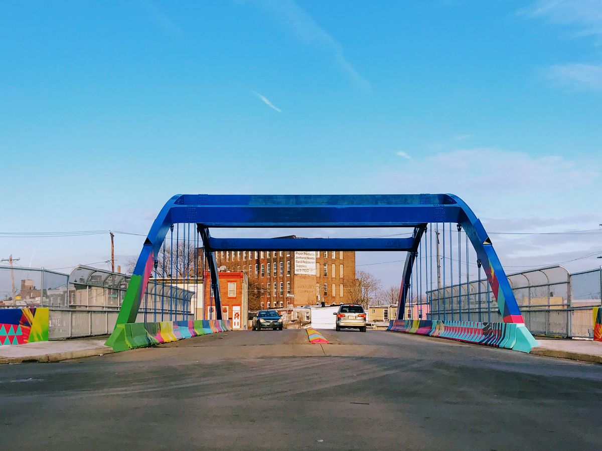 The B Street Bridge in Philadelphia which has a mural painted on it depicting a connection between cultures and the past and present.