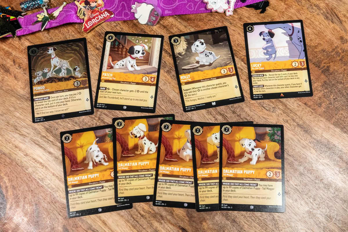 The puppy-heavy deck’s details include Pongo, Patch, Rolly, and Lucky, along with 5 unnamed Dalmatians.