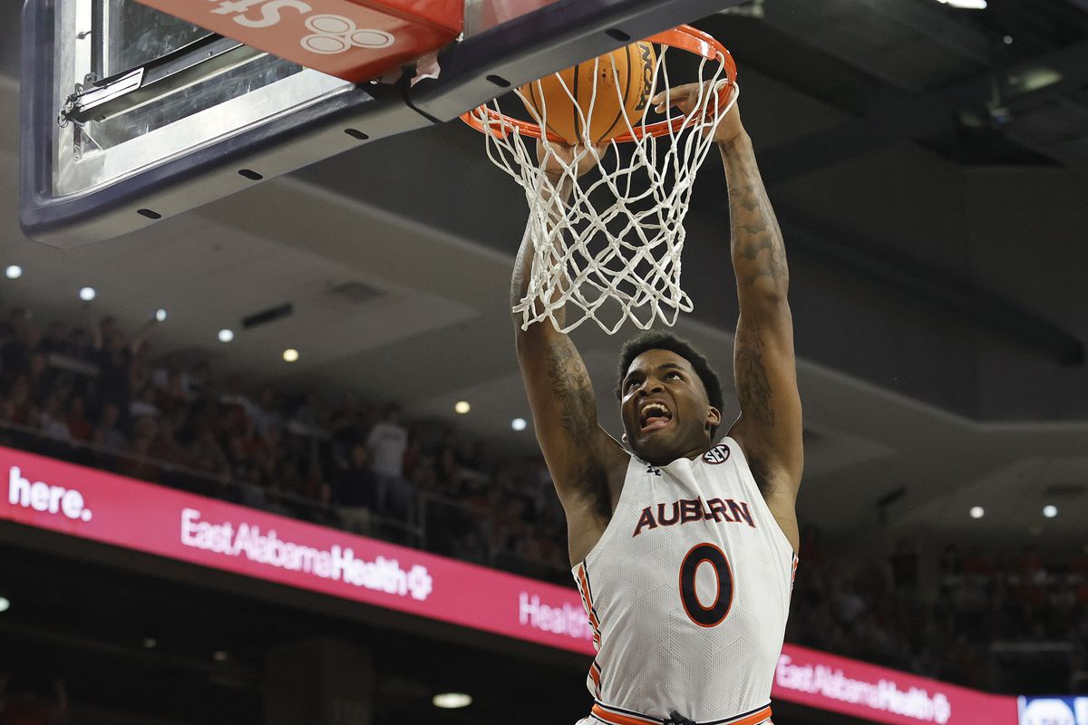 Auburn Tigers guard K.D. Johnson dunks the ball against the LSU Tigers during the second half Auburn Arena.