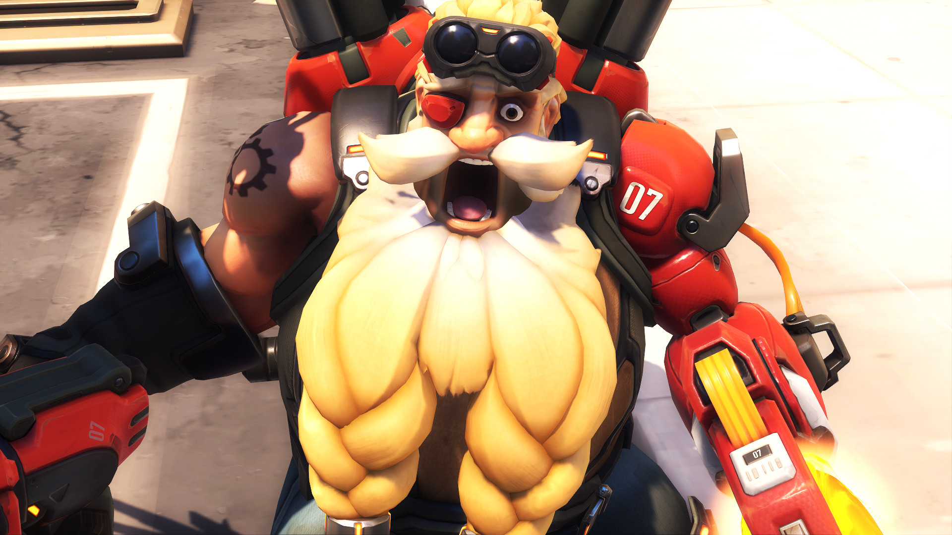 The bearded, short Torbjorn of Overwatch stares, mouth agape, into the camera