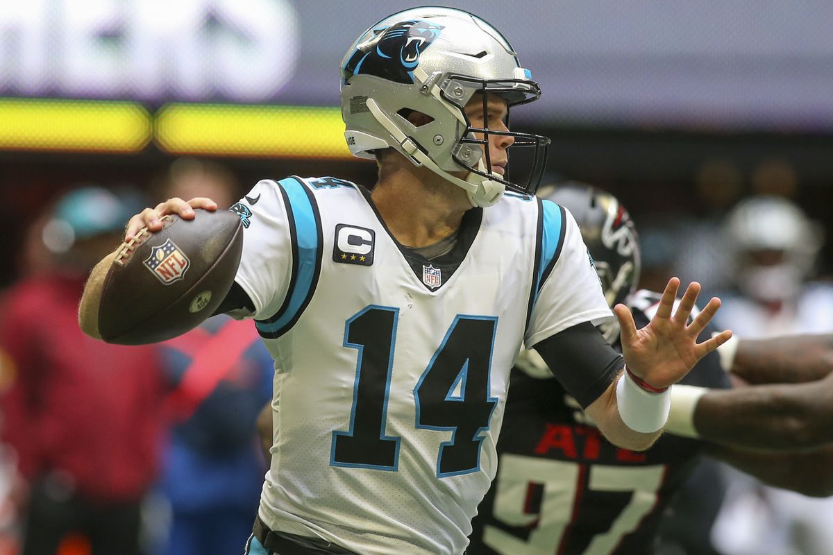 Carolina Panthers quarterback Sam Darnold (14) throws against the Atlanta Falcons in the first quarter at Mercedes-Benz Stadium.