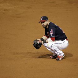 Cleveland Indians' Jason Kipnis pauses during the 10th inning of Game 7 of the Major League Baseball World Series against the Chicago Cubs Thursday, Nov. 3, 2016, in Cleveland. 