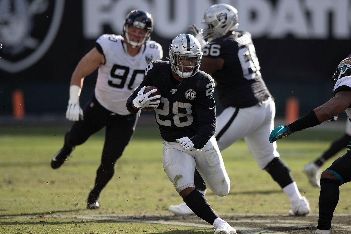 Running back Josh Jacobs of the Oakland Raiders rushes up field against the Jacksonville Jaguars during the second quarter at RingCentral Coliseum on December 15, 2019 in Oakland, California.