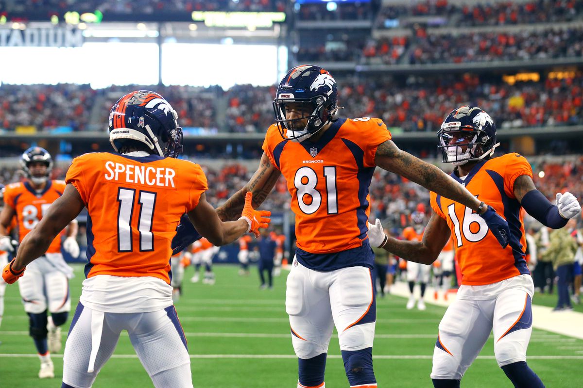Tim Patrick #81 of the Denver Broncos celebrates with teammates after catching the ball for a touchdown during the second quarter against the Dallas Cowboys at AT&amp;T Stadium on November 07, 2021 in Arlington, Texas.
