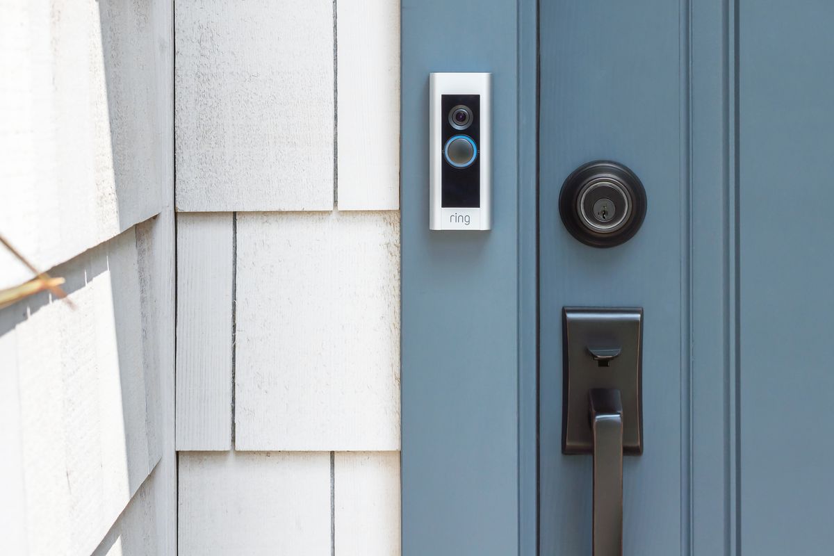 Ring doorbell on blue door