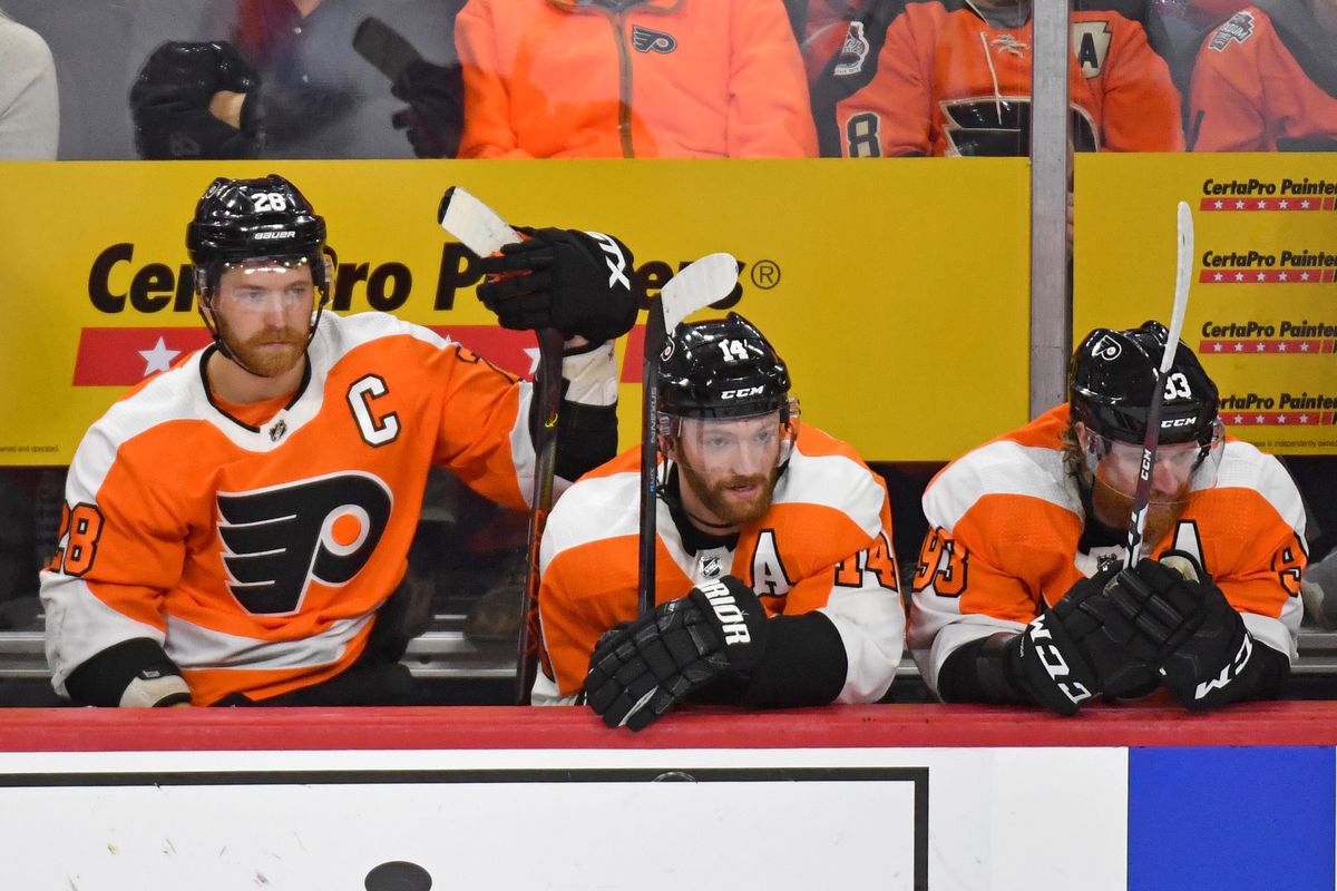 Philadelphia Flyers center Claude Giroux, center Sean Couturier and right wing Jakub Voracek on the bench late in the third period of win against the Columbus Blue Jackets at Wells Fargo Center.