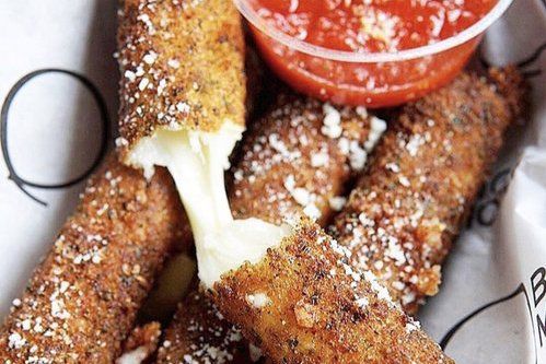 Mozzarella sticks with melted cheese.