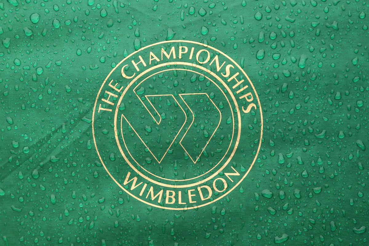 LONDON, ENGLAND - JUNE 20:  A rain soaked logo on Day One of the Wimbledon Lawn Tennis Championships at the All England Lawn Tennis and Croquet Club on June 20, 2011 in London, England.  (Photo by Oli Scarff/Getty Images)