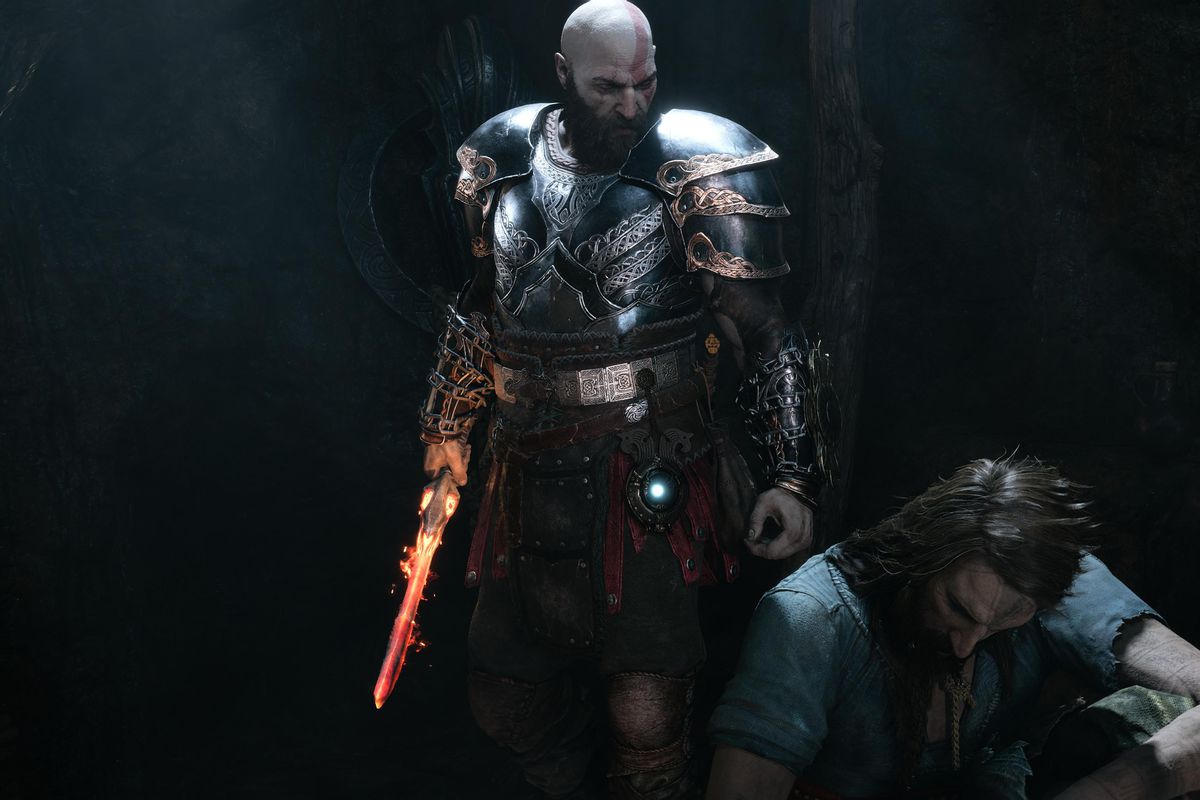 Kratos stands over Tyr kneeling on the ground in God of War Ragnarok.