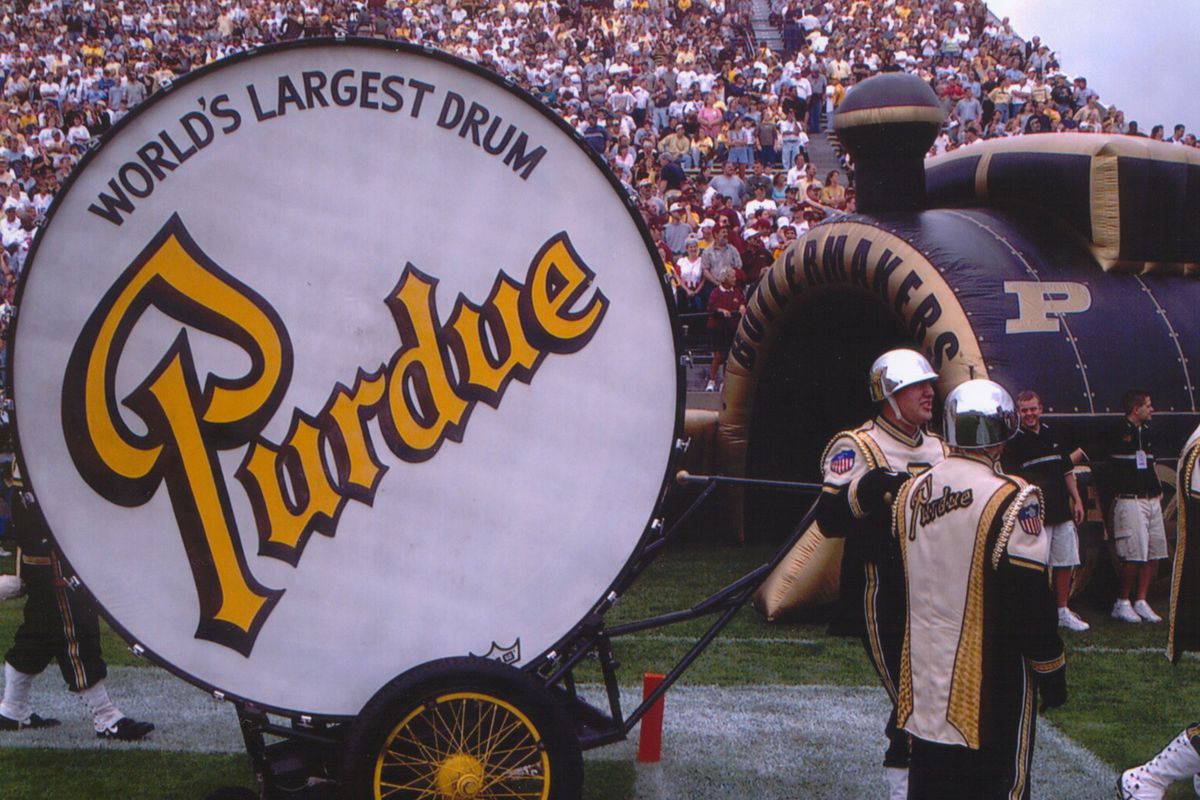 Band members of the Purdue University Boilermakers bring out the big drum at Ross-Ade Stadium in West Lafayette, Indiana.