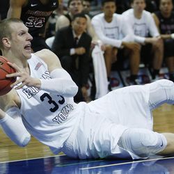 Brigham Young Cougars forward Nate Austin (33) looks to pass after falling during the WCC tournament in Las Vegas Saturday, March 5, 2016. BYU won 72-60. 