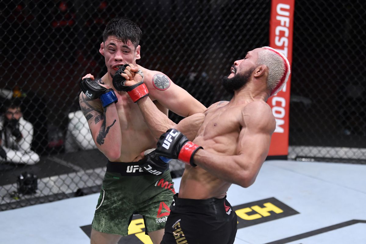 Deiveson Figueiredo vs. Brandon Moreno ends in majority draw following  potential Fight of the Year at UFC 256 - MMA Fighting