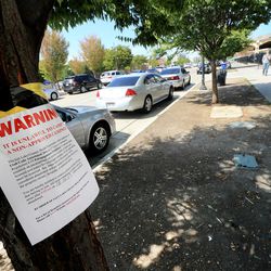 No camping signs are posted along the street as a large police presence in the Rio Grande area has forced many of the homeless out in Salt Lake City on Wednesday, Aug. 16, 2017.