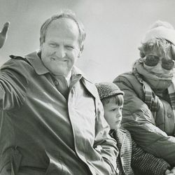 BYU head football coach LaVell Edwards waves during a parade on June 9, 1986.