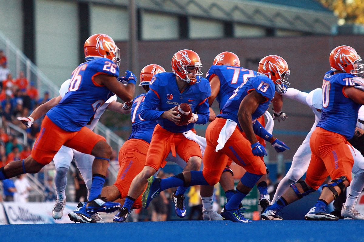Sep 18, 2015; Boise, ID, USA; Boise State Broncos quarterback Thomas Stuart (3) rolls out during the first quarter against Idaho State Bengals at Albertsons Stadium. Mandatory Credit: Brian Losness-USA TODAY Sports
