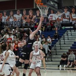 Riverton's Abigail McDougal (10) drives into the basket during a high school girls basketball game at Herriman High School in Herriman on Thursday, Jan.  27, 2022.