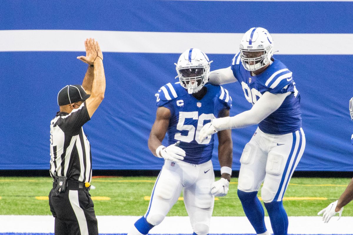 Indianapolis Colts defensive end Justin Houston celebrates his sack for a safety with defensive tackle DeForest Buckner in the second half against the New York Jets at Lucas Oil Stadium.&nbsp;