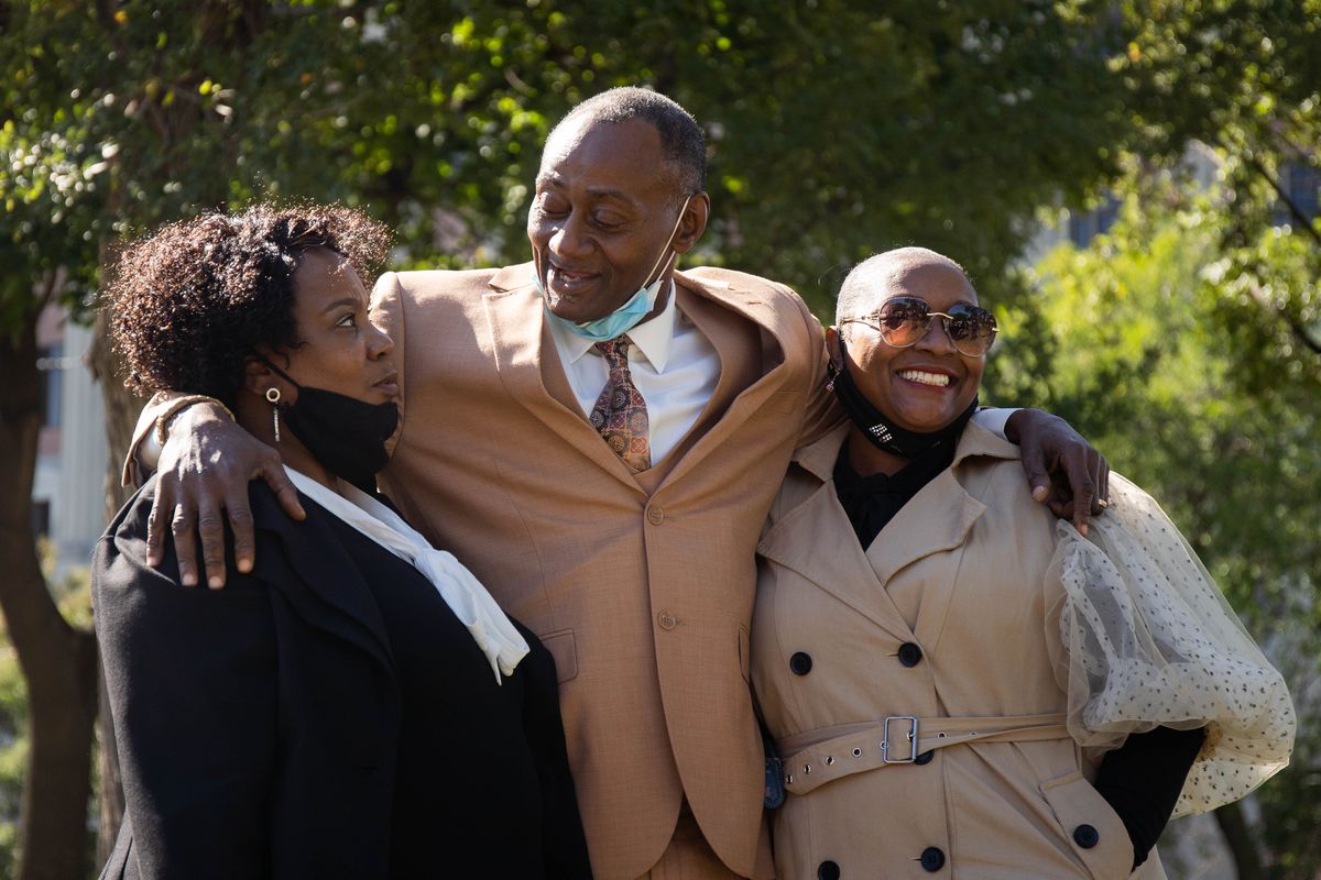 Jackie Wilson, with his wife Sandra and niece Candace, laugh outside the Cook County Criminal Court on Oct. 2, 2020.