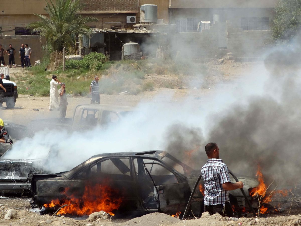 The aftermath of a car bombing in Kirkuk, the capital of Iraqi Kurdistan. MARWAN IBRAHIM/AFP/Getty Images