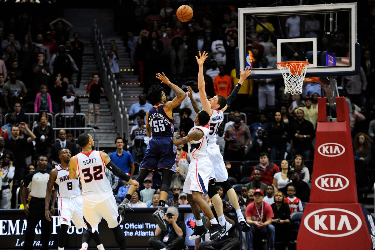 Apr 14, 2014; Atlanta, GA, USA; Charlotte Bobcats guard Chris Douglas-Roberts (55) makes a last second basket to win the game against the Atlanta Hawks during the second half at Philips Arena. The Bobcats defeated the Hawks 95-93