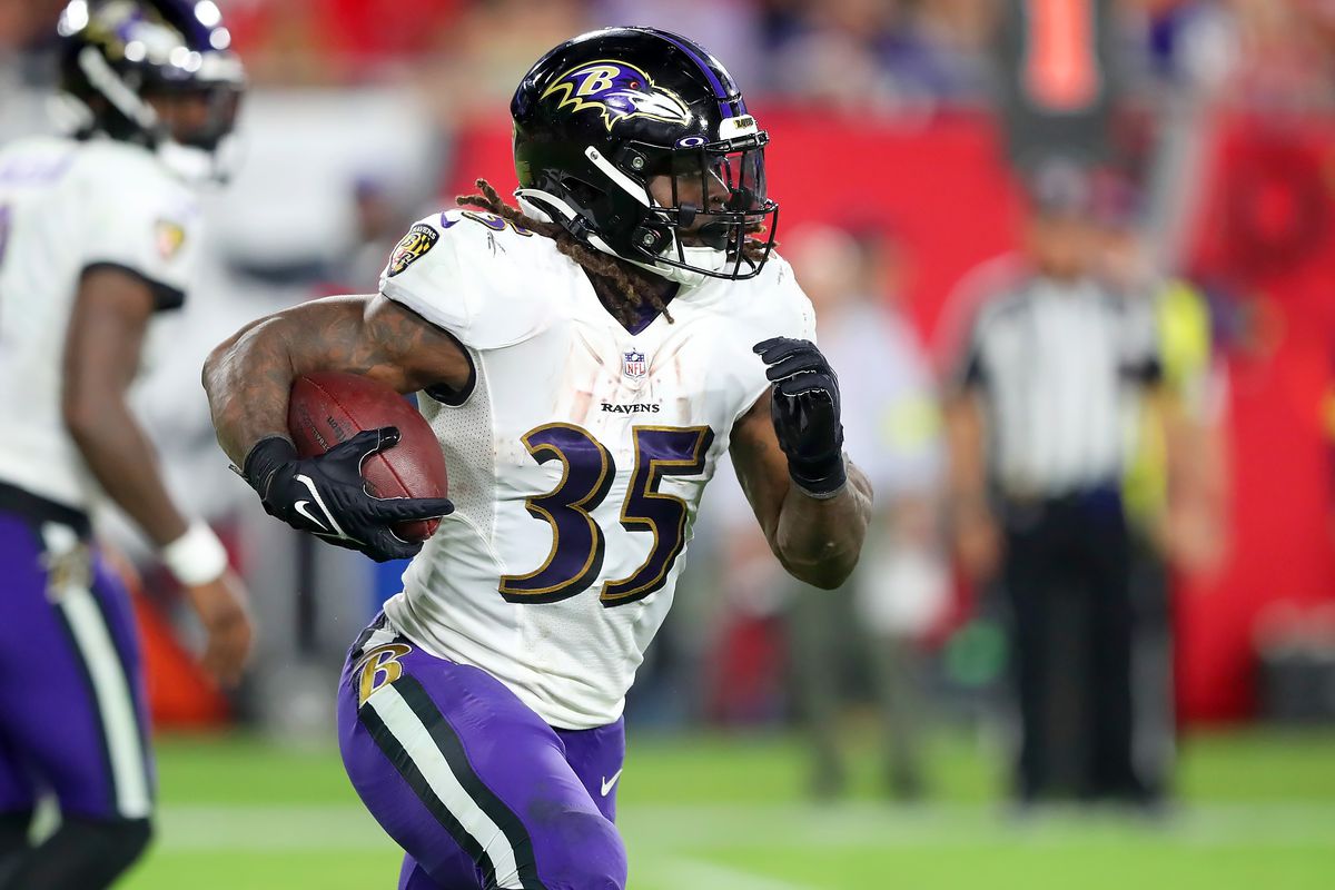 TAMPA, FL - OCTOBER 27: Baltimore Ravens running back Gus Edwards (35) carries the ball during the regular season game between the Baltimore Ravens and the Tampa Bay Buccaneers on October 27, 2022 at Raymond James Stadium in Tampa, Florida.