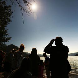 People gather at Palisades Reservoir, Idaho, on Monday, Aug. 21, 2017, to watch a total eclipse of the sun.
