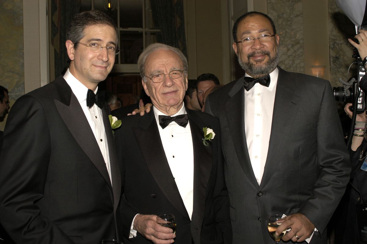 Comcast CEO Brian Roberts, 21st Century Fox exec chairman Rupert Murdoch and former Time Warner CEO Richard Parson, all wearing tuxedos