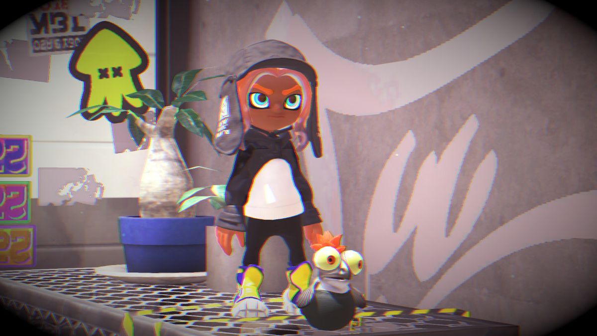 A screenshot shows the author’s Splatoon 3 character up-close, with a black flap cap and a black cape