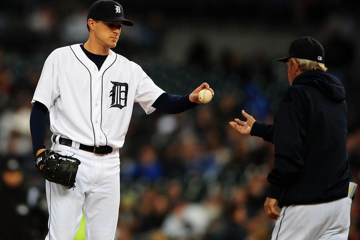 April 25, 2012; Detroit, MI, USA; Detroit Tigers relief pitcher Adam Wilk (57) is taken out of the game by manager Jim Leyland (10) in the third inning against the Seattle Mariners at Comerica Park. Mandatory Credit: Andrew Weber-US PRESSWIRE