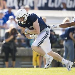 BYU tight end Matt Bushman reels in a catch during fall camp in Provo.