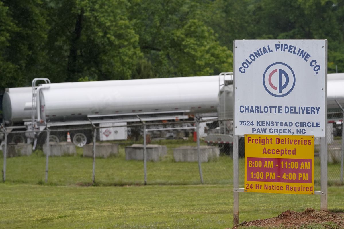 Tanker trucks are parked near the entrance of Colonial Pipeline Company Wednesday, May 12, 2021, in Charlotte, N.C.