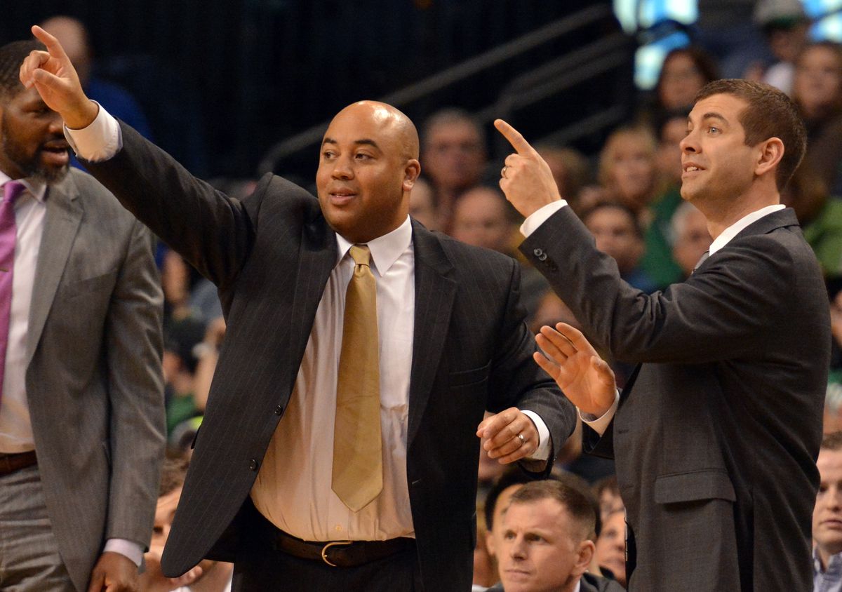 (Boston, Ma 032617) Celtics Assistant Coach Micah Shrewsberry and Head Coach Brad Stevens gesture during their game against Miami at TD Garden. March 26, 2017 Staff photo Chris Christo