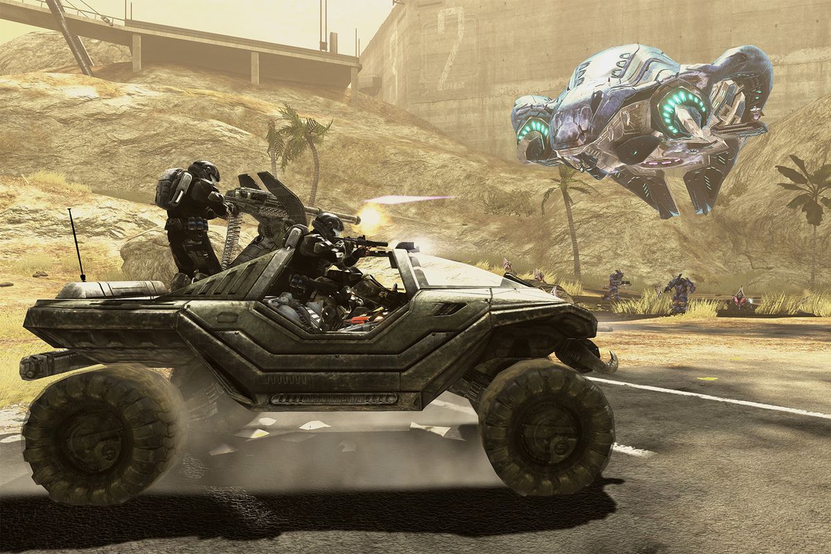 two players in a Warthog shooting at a Covenant spacecraft, in Halo Anniversary edition