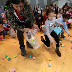 Children rush for eggs during the annual Easter egg hunt at Shriners Hospital for Children — Salt Lake City on Wednesday, March 23, 2016. 