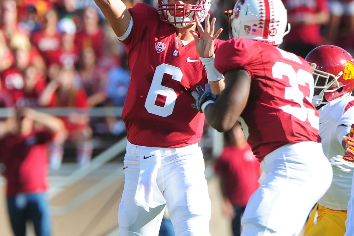 Stanford quarterback Josh Nunes (6) made several key plays to help the Cardinal upset USC, but the best thing he did all game was put the ball in the hands of running back Stepfan Taylor (33).
