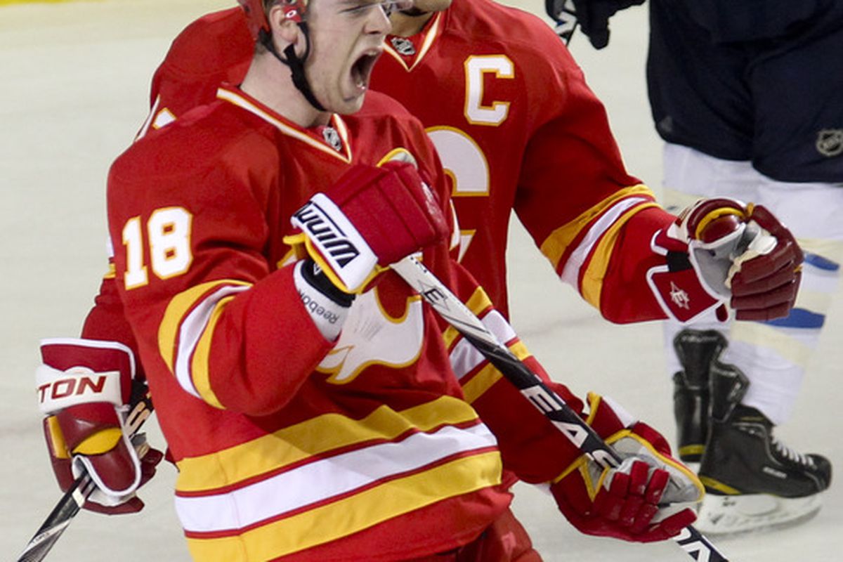No, this picture is not from last season... Matt Stajan does still play in the NHL.