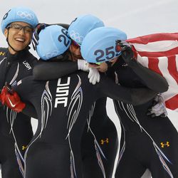 From left, J.R. Celski of the United States, Jordan Malone of the United States, Eduardo Alvarez of the United States and Chris Creveling of the United States celebrate their second-place finish in the men's 5,000-meter short-track speedskating relay final at the Iceberg Skating Palace during the 2014 Winter Olympics Friday, Feb. 21, 2014, in Sochi, Russia.