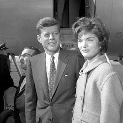 Massachusetts Sen. John F. Kennedy arrives with his wife, Jacqueline B. Kennedy, in Salt Lake City in 1959.