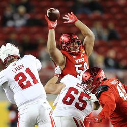 Utah Utes long snapper John Aloma (58) blocks a pass by Indiana Hoosiers quarterback Richard Lagow (21) as the Utes and the Hoosiers play in the Foster Farms Bowl in Santa Clara, California, on Wednesday, Dec. 28, 2016.