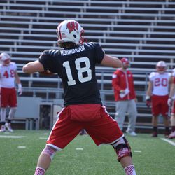 Quarterback Alex Hornibrook throws a pass during Friday's practice