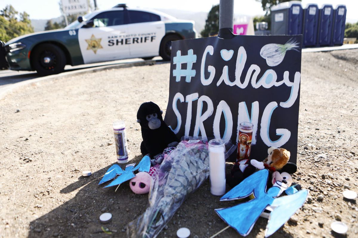A makeshift memorial is seen outside the site of the Gilroy Garlic Festival, after a mass shooting on July 29, 2019. Three victims were killed, two of them children. (Photo by Mario Tama/Getty Images)