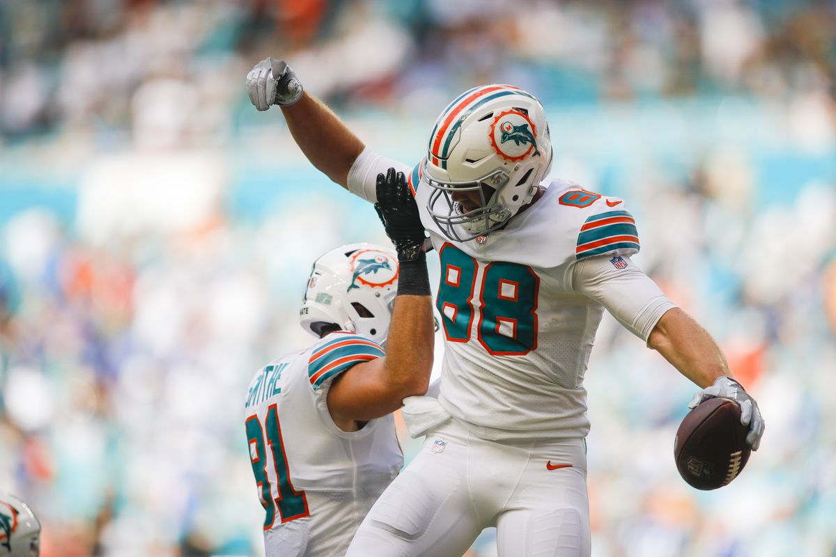 Miami Gardens, Florida, USA; Miami Dolphins tight end Mike Gesicki (88) celebrates with Miami Dolphins tight end Durham Smythe (81) after scoring a touchdown against the Indianapolis Colts during the fourth quarter of the game at Hard Rock Stadium.